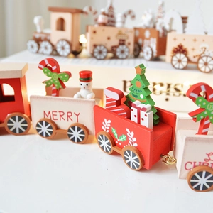 Wooden Christmas train toy with snowman and tree figures, Merry Christmas festive decoration
