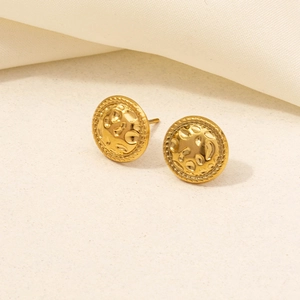 Detailed macro view of 304 stainless steel gold hammered stud earrings with braided border