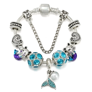 Vintage silver plated mermaid charm bracelet with blue crystals and pearl fish tail