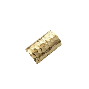 Golden textured metal hair clip with a long crocodile skin pattern finish and glossy surface