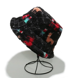 Detailed view of thick winter bucket hat with colorful animal pattern and plush faux fur