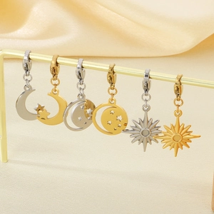 Celestial stainless steel lobster clasp charms with moon and star designs in gold and silver
