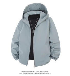 Detail of light blue-grey windbreaker with full zipper and adjustable drawstring hood