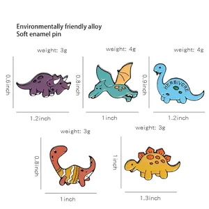 Set of 5 cartoon enamel dinosaur pins including triceratops and pterosaur in colorful alloy