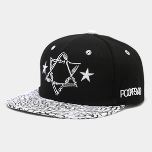 Detailed embroidery of star pattern and side text on black flat brim snapback hat
