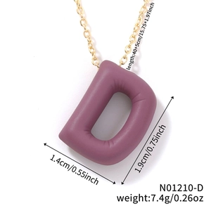 Detail view of purple letter D pendant with gold chain and dimensions specifications