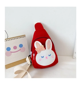 Close-up of red canvas kids chest bag with cute rabbit face and sequins decoration