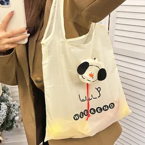 Foldable white cartoon dog shopping bag with Weekend print and cute puppy charm