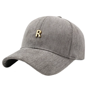 Grey herringbone baseball cap with gold metal R logo shown from a 45-degree angle view