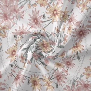 Close-up of bohemian floral tapestry fabric showing soft pleats and mandala pattern details