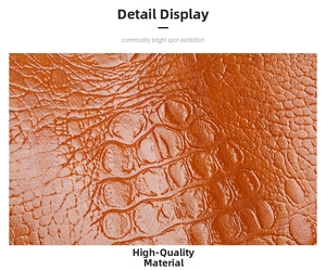 Close-up of brown crocodile pattern leather texture on a retro tote handbag