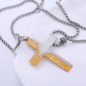 Two-tone stainless steel cross necklace with Spanish Lord's Prayer engraving and gold accents