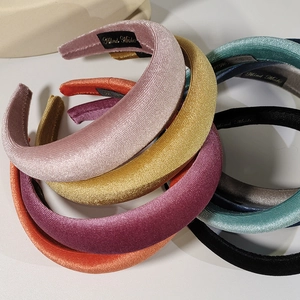 Padded velvet headbands set in various colors including pink, burgundy, and navy blue
