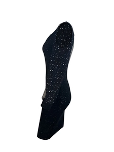 Detailed side view of black sequin V-neck evening dress with mesh sleeves and slim fit cut