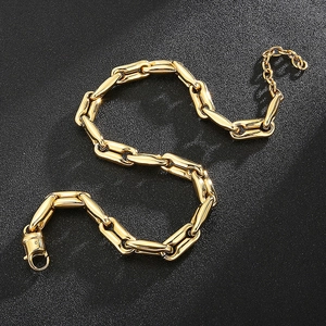 Golden hip hop coffee bean chunky chain link necklace with lobster clasp on black background
