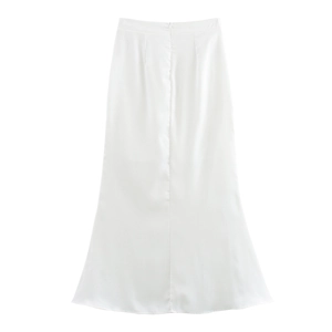 Detail of the white satin long skirt showing smooth fabric texture and invisible zipper