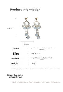 Detailed view of floral drop earrings with rhinestones and pearls showing 9.3cm length