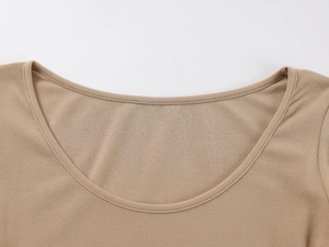 Detailed close-up of khaki U-neckline and fine ribbed knit texture on a bodysuit