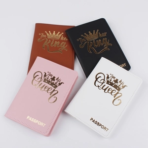 Set of four PU leather passport covers in brown black pink and white with gold foil print