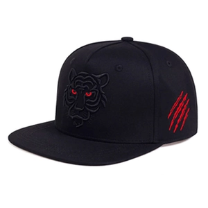 Black flat-brim baseball cap with tiger head embroidery and red scratch details