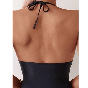 Slim fit black backless one-piece swimsuit with halter neck ties and mesh details