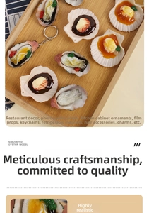 Close-up of realistic resin oyster and scallop food models with detailed textures
