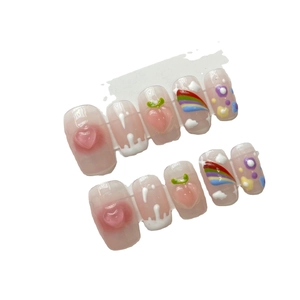 Unghie finte 3D fatte a mano con decorazioni arcobaleno, pesca e cuore su rosa