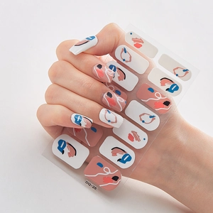 Detailed view of minimalist abstract nail art stickers with geometric patterns on model hand