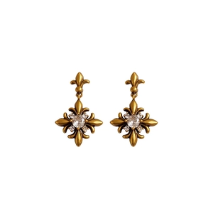 Vintage gold fleur-de-lis earrings with rhinstone accents and brushed metal finish