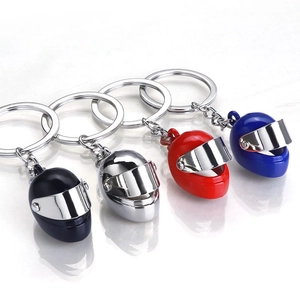 3D mini motorcycle helmet keychains in black, silver, red and blue metallic finishes