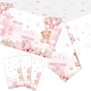 Detail of pink teddy bear party tablecloth and matching bunting for baby shower