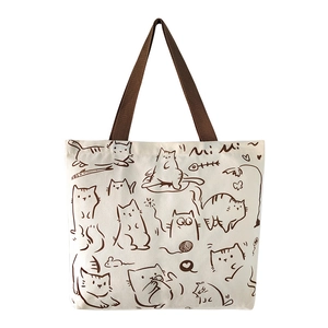 Minimalist canvas tote bag with hand-drawn brown cat illustrations and sturdy handles