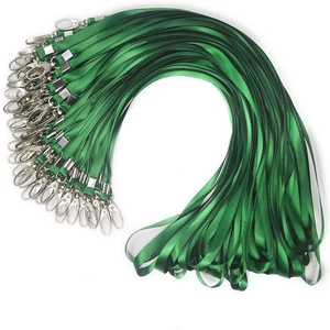 Batch of green flat woven lanyards with silver metal lobster claws on white background