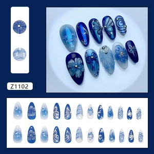 3D floral butterfly press-on nails set with ocean blue pearl and shell texture