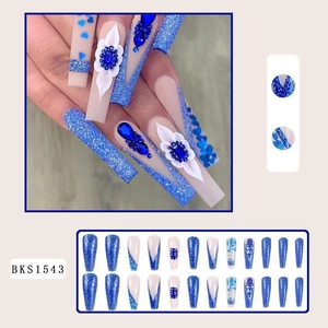 Detail of BKS1543 blue and white press-on nails with 3D flowers and blue gemstones