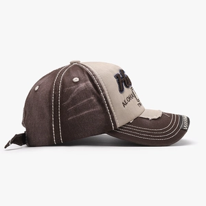 Vintage two-tone baseball cap with H embroidery and distressed brim detail