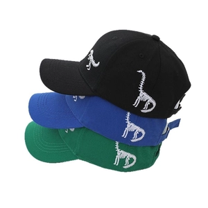 Kids baseball cap set featuring white dinosaur skeleton embroidery in black, blue and green