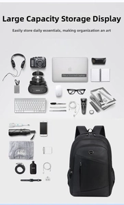 Flat lay of black business laptop backpack showing organized storage for 15.6 inch laptop