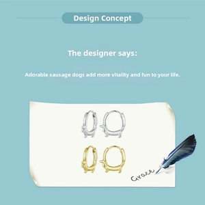 Detailed view of S925 sterling silver dachshund earrings on designer sketch paper
