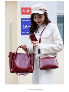 Three-piece dark red tote set including crossbody bag and small pouch on street model