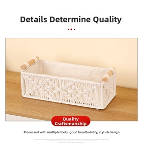 Detail of hand-woven cotton rope storage basket with wood handles and fabric lining