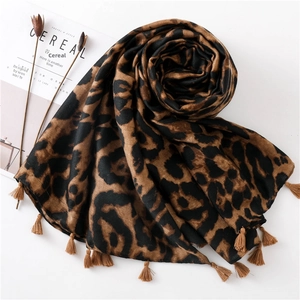 Elegant leopard print cotton linen scarf shawl with fringe trim for beach and travel