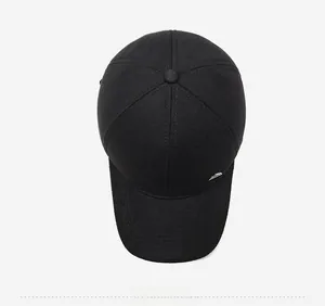 Top down view of black wool baseball cap with classic six-panel design and metal logo