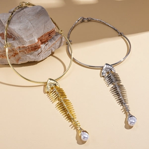 Exaggerated metal fishbone choker necklace with pearl pendant in gold and silver finish