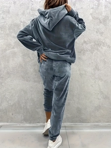 Rear view detail of dark gray velvet hoodie set showing soft fabric texture and relaxed fit