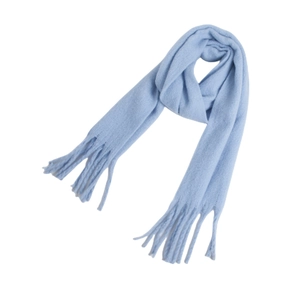 Detailed view of the soft light blue mohair scarf featuring elegant fringed edge tassels