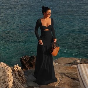 Elegant black long-sleeved cutout maxi dress with beach-style A-line silhouette