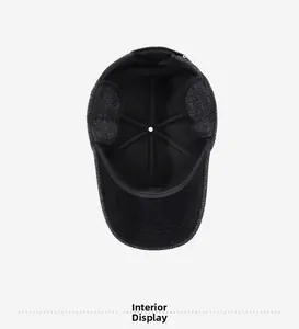 Interior view of men's wool flat cap showing thermal lining and ear protection flaps