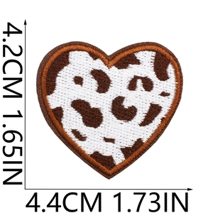 Detailed size view of heart shaped cow print embroidery patch measuring 4.4cm x 4.2cm