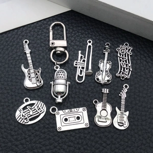 Nine pieces of vintage silver musical instrument charms for DIY jewelry and accessories